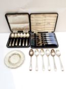 A collection of silver, including a set of six Georgian tea spoons, boxed set of six silver coffee