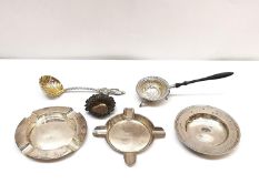 A collection of silver, including a Victorian gilded sugar sifting spoon by Chawner & Co with carved