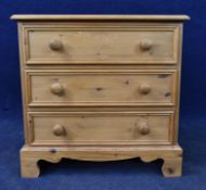 Chest of drawers, 19th century style pine. H.71 W.71.5 D.48cm.
