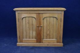A 19th century pitch pine kitchen cabinet. H.87 W.110 D.47cm.