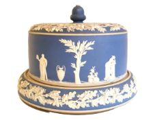 A Victorian Jasperware cheese dome with classical figural decoration. H.20 Diameter 26.5cm. (Small