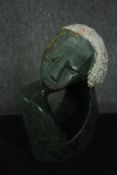 An African carved soapstone Shona bust study, signed to the base. H.22cm.