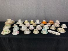 An extensive collection of 19th century and later porcelain items, mostly coffee and tea cups and
