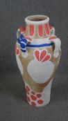 A large hand painted classical style terracotta urn. H.78cm.