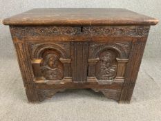 An 18th century carved oak Spanish coffer. H.70 W.89 D.53cm.