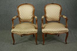 Armchairs, a pair Louis XV style carved walnut. H.87cm. (each).
