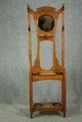 Hallstand, late 19th century light oak carved with Art Nouveau motif. H.190 W.61 D.25cm.