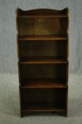 A mid century oak open bookcase. H.120 W.53 D.24cm.