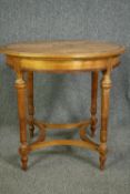 A mid 19th century continental satinwood and oak top centre table, the top with a simulated grain.