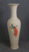 A large mid century floor standing urn with hand painted bird of paradise decoration. H.140cm.