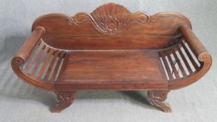 A carved Javanese hardwood canape sofa. H.80 W.150 D.54cm.