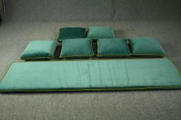 Six velour and piped cushions and a large matching bench cushion. L.212 W.58cm. (largest).