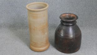 A stoneware vase and a terracotta umbrella stand. H.58cm. (largest).