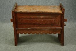 Bench coffer, Eastern carved hardwood. (Top in need of some repair). H.71 W.83 D.30cm.
