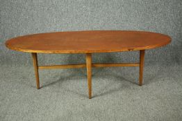 A mid century teak Gordon Russell coffee table. H.40 W.122 D.46cm.