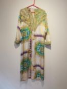 After Versace, a vintage cream, turquoise, purple, green and gold renaissance tennis racquet