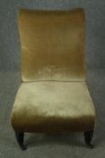 A late 19th century bedroom chair upholstered in piped velour. H.81cm.