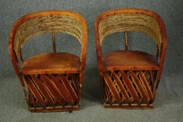 A pair of vintage cane and bamboo tub armchairs with leather seats. H.80cm. (each).