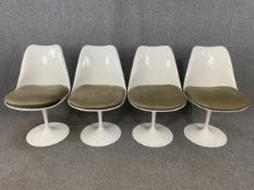A set of four 1960's vintage Eero Saarinen for Arkana tulip dining chairs with Form International