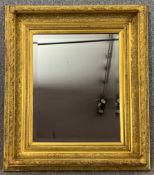Wall mirror, carved giltwood and gesso in 19th century style with bevelled plate. H.75 W.65cm