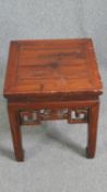 A Chinese carved hardwood lamp table. H.50 W.45 D.45cm.