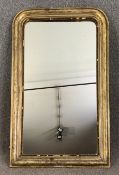 Pier mirror, 19th century gilt framed French with incised scrolling foliate detail. H.142 W.87cm