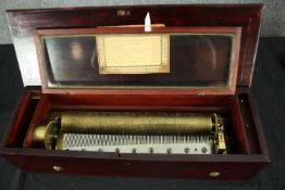 A late 19th century Swiss cylinder musical box, eight airs in mahogany case with transfer