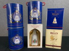 Six bottles of commemorative presentation boxed bell's whisky. H.26 W.16 D.16cm (largest box).