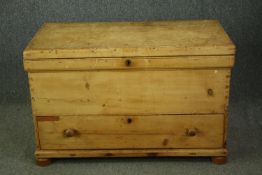 Coffer, 19th century pine fitted with candle box and base drawer. H.72 W.111 D.60cm.