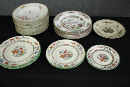 A set of 19th century hand decorated Limoges bowls along with Copeland and others plates and