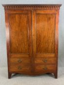 Wardrobe, 19th century mahogany, panel doors with faux drawer fronts enclosing hanging space. H.