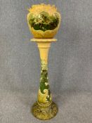 A 19th century Burmantofts Faience jardiniere on stand, hand decorated and stamped Leeds Art