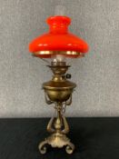 An Art Nouveau Messenger brass and tangerine glass oil lamp converted for electricity. H.67cm
