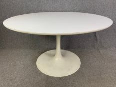 A 1960's vintage Eero Saarinen for Arkana tulip dining table, marked to base. H.74 Dia.136cm