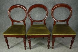 Dining chairs, a set of three Victorian mahogany.