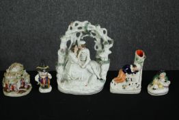 A collection of five 19th century Staffordshire figure groups. H.23 W.20cm. (largest).