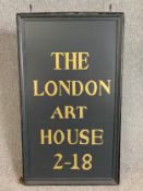 A vintage heavy iron framed hanging sign with sign written panel. H.118 W.69cm
