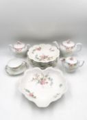 Five Limoges plates and a heart shaped dish, along with a tea set for one with Russian maker's marks