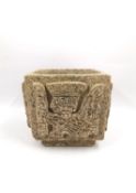 A South American carved stone planter, H.19, 22 x 22.5cm