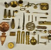 A miscellaneous collection of brass items.