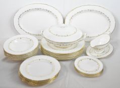 A part dinner service comprised of 29 items of Royal Worcester Gold Chantilly porcelain.