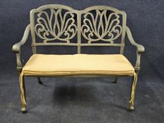 A contemporary 19th century style metal alloy garden bench. H.91 W.111 D.62cm.