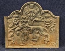 An early 18th century style cast iron fireback. H.66 W.75cm.