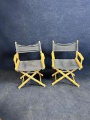 A pair of folding director's chairs. H.80 W.58 D.40cm