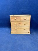 A Victorian style pine chest of drawers. H.94 W.92 D.45cm