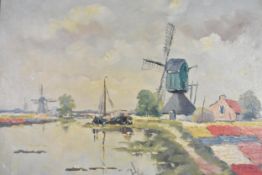 A framed oil on canvas, Dutch landscape, indistinctly signed. H.55 W.63cm