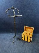 A wrought metal valet stand along with a metal bound cellarette box. Stand H.118 W.48 D.30cm. Box