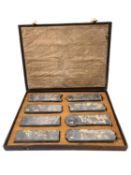 A Chinese calligraphy stone ink block set circa 1900, intricately carved in relief and hand