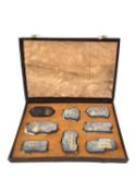 A Chinese calligraphy stone ink block set circa 1900, intricately carved in relief, hand painted and