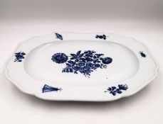 A 19th century blue and white Meissen platter with a central floral design with insects and sprigs